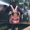 Estilo de mochila moda versão coreana rosa cinza de laptop mulheres grande capacidade de sacos de escola para adolescentes podem ser usadas com a mão