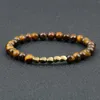 Bärade strängar Counples Men Armband Ethnic Tibetan 6mm Natural Tiger Eye Stone Pärlor flätade oregelbundna koppararmbandbanglar Friends FA