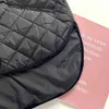 Automne hiver femmes manteau noir avant court et long design lâche simple boutonnage coton veste chaude 211216
