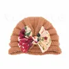 子供の帽子ベビーウールの帽子冬の暖かい弓ニットキャッププルオーバーキャップ9195
