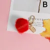 Fluffy Artificial Rabbit Fur Ball Nyckel Kedja Pompons Keychain Women Car Bag Key Ring Smycken För Vänner Gåva