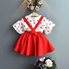 Sommar polka dots söt baby outfit toddler tjejer 2st kläder uppsättning bomull t-shirt med hoppa kjol 210529