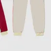 رجل إمرأة عارضة تراكسويت الأزياء إلكتروني طباعة sweatsuit الرجال الدعاوى الكلاسيكية تتسابق الرجال قطعتين السراويل الربيع سترة الرجل