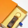 Lüks Tasarımcı Keychain Toka Lovers Araba Keyasyonu El Yapımı Deri Tasarımcıları Anahtarlıklar Erkek Kadın Çanta Anahtar Yüzük Kolye Accessori8319b
