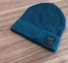 Frete grátis gorro de inverno masculino feminino bonés de malha casuais bonés esportivos masculinos preto cinza branco amarelo bonés de caveira de alta qualidade