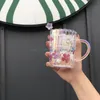 Starbucks muggar elektroplätering av färg Cherry Blossom Glass Creative Flower Coffee Cup Heat-resistent Water Cups217G