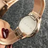 Fashion Top Brand wrist watch for women Men flower style Steel metal band quartz watches TOM27215O