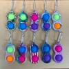 Porte-clés Fidget Toy, 50 pièces, jouets pour doigts, jeu de société Pop Push Bubble, anti-Stress sensoriel, impression colorée