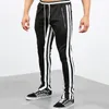 Calças masculinas 2021 homens corredores casuais fitness homem sportswear tracksuit fundos skinny sweatpants calças pretas ginásios