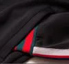 2021デザイナートラックスーツ高級服のジャケット赤緑の縞模様のウインドブレーカーのoutwearコートクラシックダブルスリーブ文字プリントスーツのパッチワーク