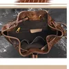 Kvinnor Äkta Läder Skopa Väska Amerikansk stil Real Cowhide Leather Shoulder Kvinna Messenger Crossbody