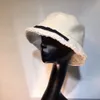 Chapeau de seau pour femme à la mode Casquette de baseball pour femme channe chapeau de pêcheur Chapeau de seau collage de haute qualité.060