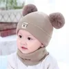 幼児男の子の女の子子供の首の暖かい冬のかぎ針編みの赤ちゃんの帽子