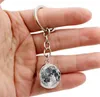 LLavero de estrella del universo con doble bola de cristal, llavero de Luna Solar, portallaves, bolsa para colgar, regalo de joyería