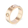 Högkvalitativ designer Titanium Steel Ring Mode Smycken Man Bröllop Promise Ringar för Kvinna Anniversary Gift