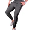 Mens Side Stripes Skinny Pants Fashion Trend Elasticity Hip Hop Drawstring Pants Spring Male New Solid Color Skateboard Casual Slim Trousers