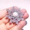 EKOPDEE Sparking Luxo Aaa Zircon Broches Para As Mulheres CZ Cristal Floco De Neve Brooch Vestido Pins Nupcial Partido De Casamento Jóias 2021