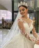 Abiti da sposa vintage con maniche lunghe in pizzo e abiti da sposa Dubai Arabo con collo trasparente e applicazioni senza schienale con paillettes Abiti da sposa di lusso Robe de mariage BC11371