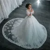 Elie Saab 2021 Bridal Gowns Scoop Lace Appliqued Beaded Long Sleeves Hollow Buttons Back Puffy Ruffle Chapel Train Wedding Dresses