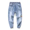 Mäns oregelbunden skärning smal passform elastisk midjeband midja sträng jogger denim jeans långa byxor byxor pantaloner för män x0621