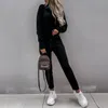 Pantaloni da donna a due pezzi Pantaloni da donna a maniche lunghe 2 pezzi Set da donna Abiti eleganti solidi Set primavera autunno Tasche con cappuccio Abiti Streetwear Jogger