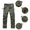 Homens Militares Militares Tactical Elasticity Bolso Carga Calças de Algodão Algodão Corredores Ao Ar Livre Calças Plus Size Calças Homens H1223