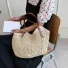 Shoppingkassar Sommarstrand Kvinnor Vävd ihålig ut axelkvinna Bohemian Travel Straw Stor kapacitet Shopper 220303