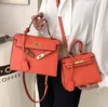 fábrica por atacado Mulheres Bolsa Bola elegante Atmosfera Litchi Padrão portátil Bolsas de ombros portáteis Moda de moda verde Bolsa Bolsa de Messenger de couro 8222