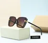 2023 Luxury Designer Summer Style Temperament Women Solglasögon Super Light UV Protection Fahion Mixed Color Come With Box Glass