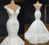 uxury sjöjungfru bröllopsklänningar 2022 Illusion Neck Lace Appliques Ärmlös Bridal Dress Sweep Train Beaded Vestido de Noiva