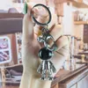 Kreatywna osobowość trójwymiarowa przestrzeń Astronauta Robot Keychain Akrylowy Samochód Key Ring Exquisite Mały Prezent Wisiorek G1019