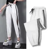 Koreanska versionen Joggers Kvinnors Harembyxor Högt midja Lace Cutout Sommar Ankle-längdbyxor för kvinnor 2020 Casual Loose Bloomers Q0801