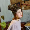 Berretto / cranio Cappucci in autunno e inverno caldo moda personalità di moda leopardo stampa grande palla a maglia a maglia con lana manica testa flangia
