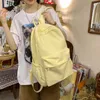 防水ナイロンの女性のバックパックの女性旅行袋のバックパックのBackpacks Schoolbagのための女の子の色のブックバグMochila Bookbag 210929