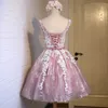 Sexy Open Back Roze en Wit Kant Homecoming Jurken Knielengte Korte Licht Roze Tule Prom Dress Mouwloze A Line Cocktail Party Draag 2022