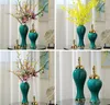 Vazolar Europes Buje Stijl Koyu Yeşil Keramische Opslag Pot Metiksel Emaille Heldere Vergulde Bloemen Woondecoratie Art