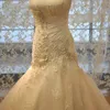 Elégante robe de mariée généreuse de mariée de robe sans bretelles avec applique robe de mariée sans dos sans dos, église officielle Plus Taille Vestido de Noiva