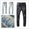 Luxurys Designer Mens Jeans En son listeleme şeritleri mektup denim pantolon moda yırtılmış rahat homme erkek delik pantolon w29-40