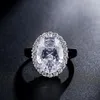 Anéis de casamento BeaQueen Impressionantemente Grande Oval Cubic Zirconia Pedras Pavimentadas Rodada Cristal Noivado Declaração Jóias Para Mulheres R0058464832