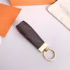 Luxury Designer Car Leather Keychain Fashion Female Mens Söta lång av hög kvalitet Golden Key Chain276z