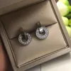 Boucles d'oreilles pour femmes à la mode avec zircon en diamant. Acier au titane de haute qualité. Bijoux classiques de marque de luxe