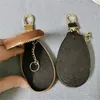 Fashion Key Buckle Bag Car Keychain Handmade Leather Keychains Man Woman Purse Bag Pendant Accessories for womens and mens6670262