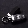 Llavero Clásico Exquisito Diseñador Coche Llavero Gamuza DIY Unisex Cordón Rojo Negro Pequeña Joyería Amante Colgante