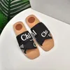 2021 designer Kvinnor Woody Mules Fflat Tofflor Slide Sandal Deisgner Lady Bokstäver Tyg Utomhus Läder Sole Slides Sandaler med låda