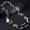 Fashion Luxury Designer Classic Strings Fiore Elegante perla brillante Multistrato Lungo maglione invernale Collana di dichiarazione per donna1057554