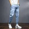 Pantalones vaqueros para hombre, pantalones bombachos informales holgados a la moda para hombre, pantalones bombachos con estampado de letras, azul claro, estilo Hip Hop, de gran tamaño, con lazo en los pies, ropa de calle vaquera 2021