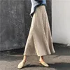 Colorfaith femmes printemps hiver tricoté Midi a-ligne jupes mi-mollet Empire Style coréen élégant mode solide jupe SK4240 210306