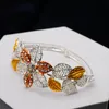 Orecchini Collana Set di gioielli Bracciale lungo a forma di fiore Dubai Gold Set per le donne Anello da sposa per la festa nuziale