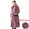 冬の女性の高品質のFauxの毛皮のコートの贅沢な長い毛皮のコート緩いラペルベルトオーバーコート厚い暖かいプラスサイズの女性の豪華なオーバーコートファッションオールマッチの雪は必需品