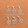 Alloy Slim Hollow Snowflake Hummer Claw Clasp Charm Loose Pärlor 15.5x33.5mm Tibetansk Silver Smycken DIY C790 100PC / Lot